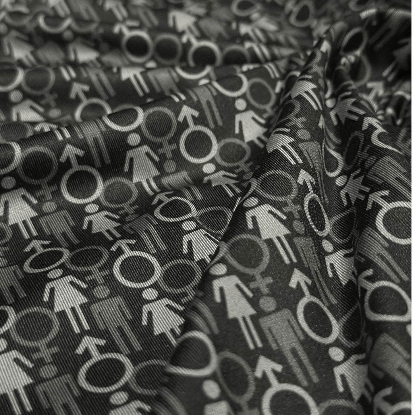 Men's 2 Genders Golf Shirt in black and grey. Close up of polo material.