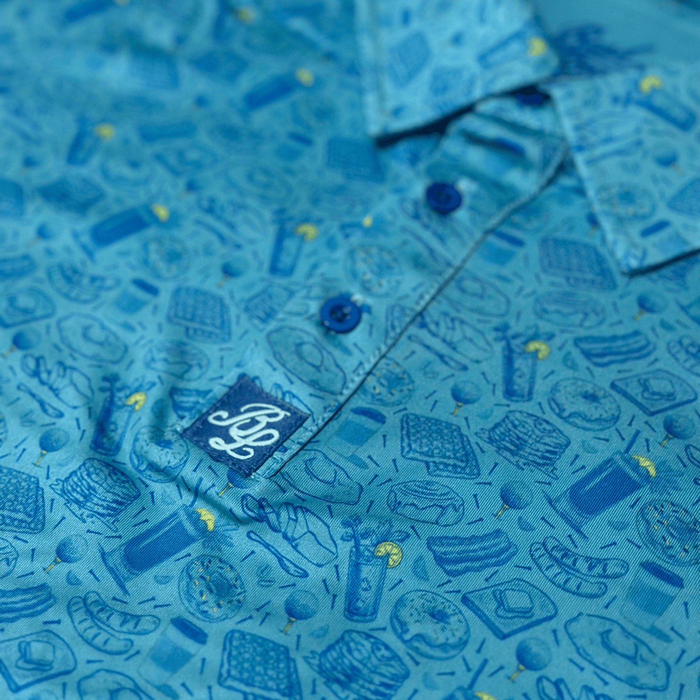 Men's Breakfast Ball Golf Shirt. Close up of placket.