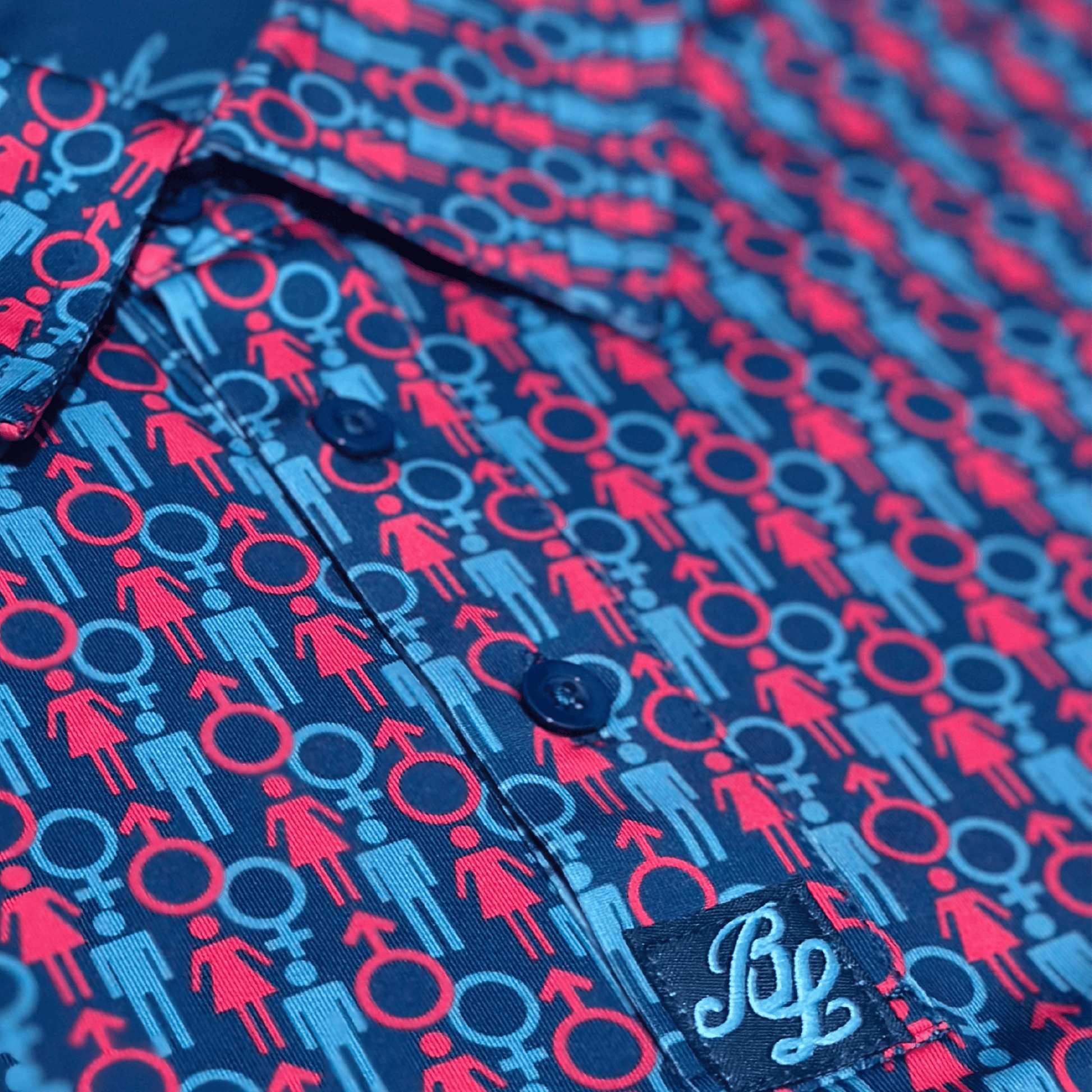 Men's 2 Genders Golf Shit in blue and pink. Close up of placket. 