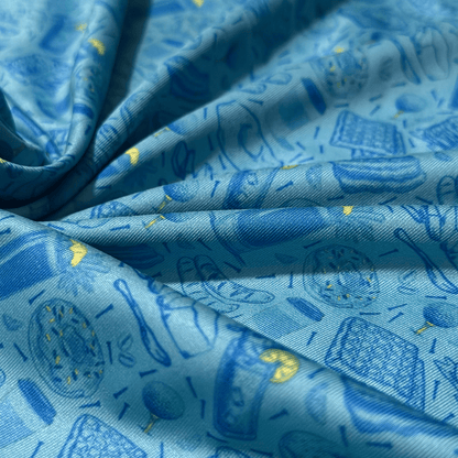 Men's Breakfast Ball Golf Shirt. Close up of polo material. 