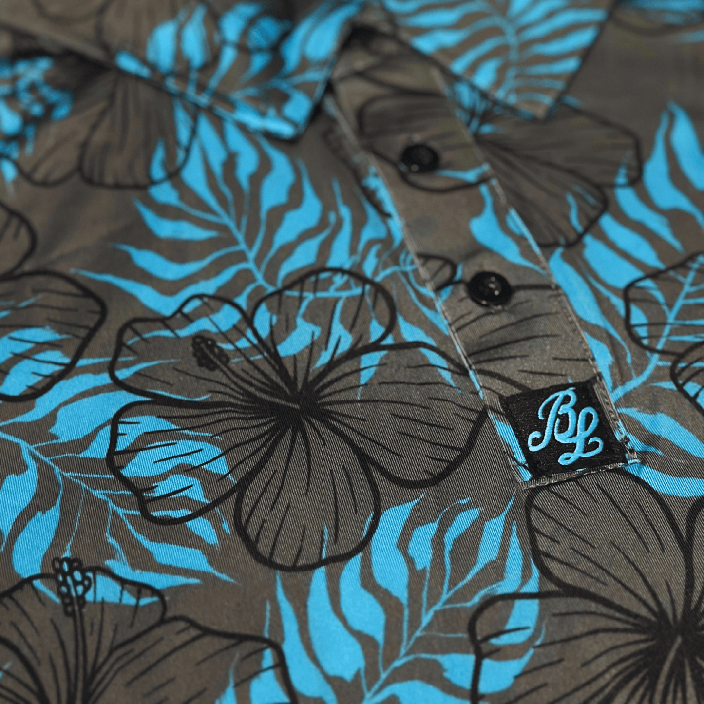 Men's Hibiscus Golf Shirt in grey and light blue. Floral golf polo. 